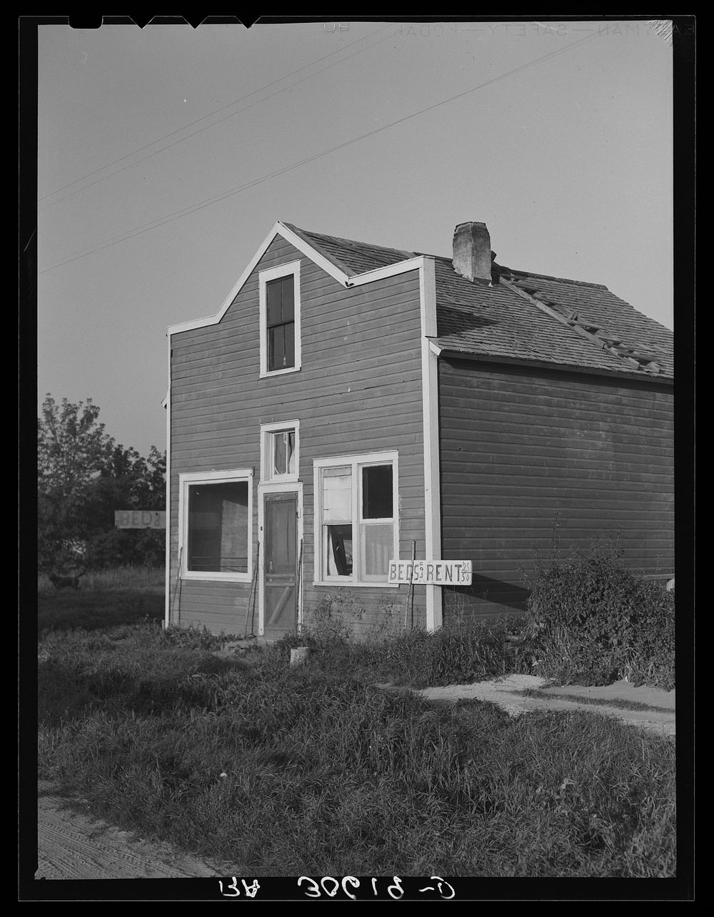 Boarding house at Littlefork, Minnesota, used mostly by lumberjacks by Russell Lee