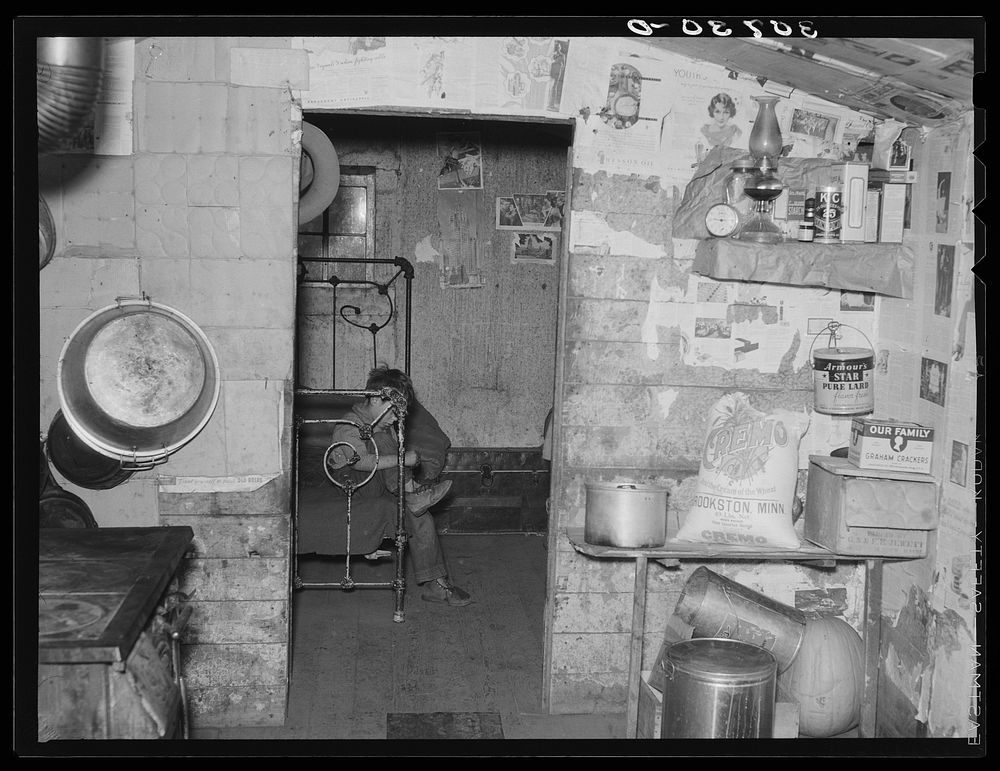 Interior of shack occupied by Mexican beet workers. Near East Grand Forks, Minnesota by Russell Lee