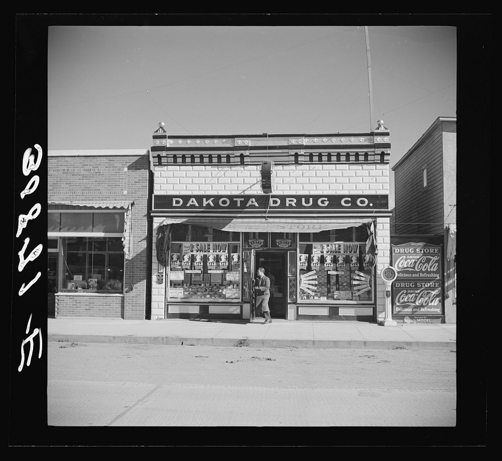 Drug store. Stanley, North Dakota by Russell Lee