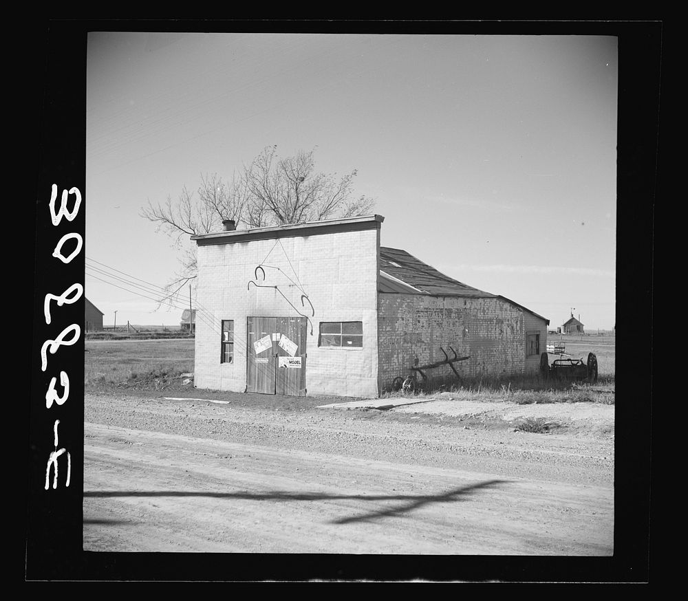 Blacksmith shop. Des Lacs, North Dakota by Russell Lee