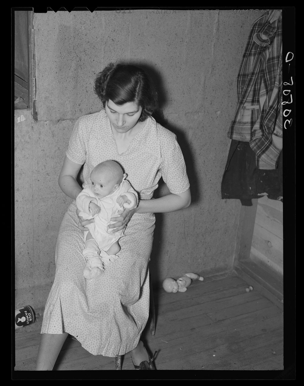 Undernourished three-months old baby of Nels Birkeland. Near Williston, North Dakota by Russell Lee