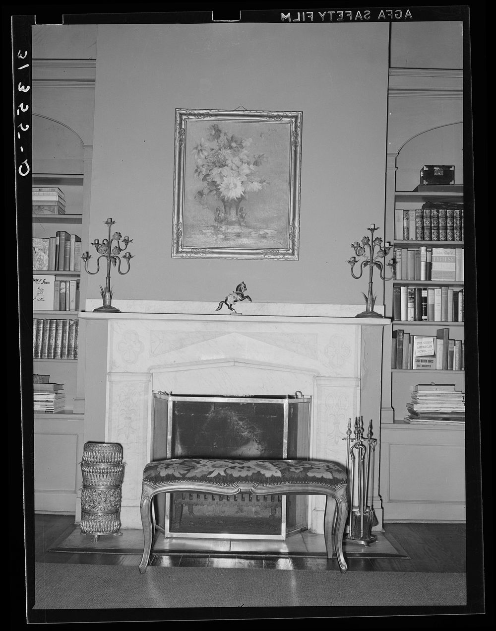 Fireplace and mantle in old plantation house near New Orleans, Louisiana by Russell Lee