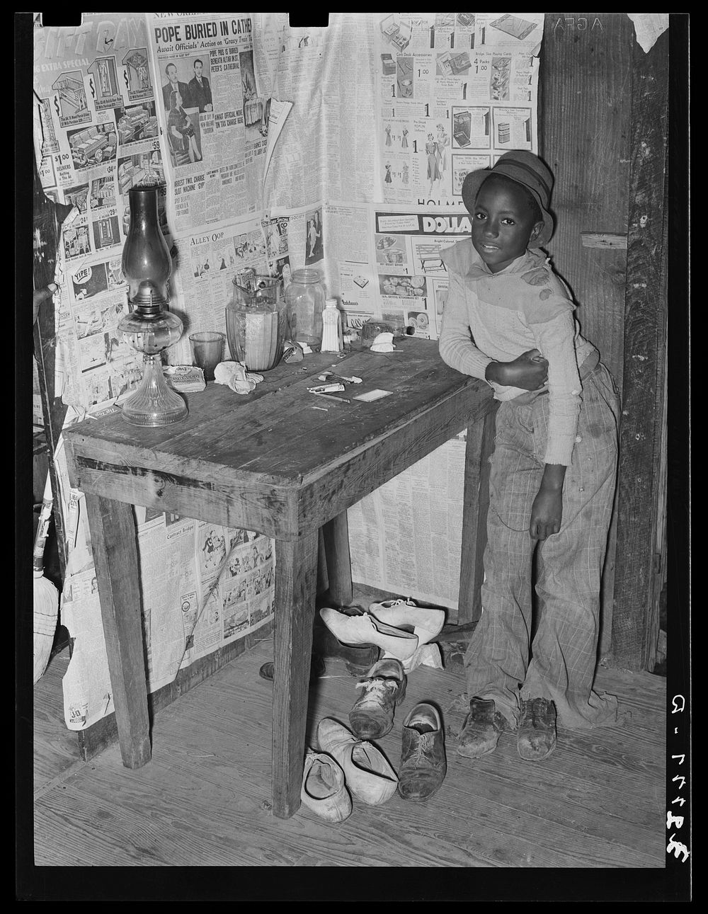 Corner of room of living quarters provided for  strawberry pickers near Independence, Louisiana by Russell Lee