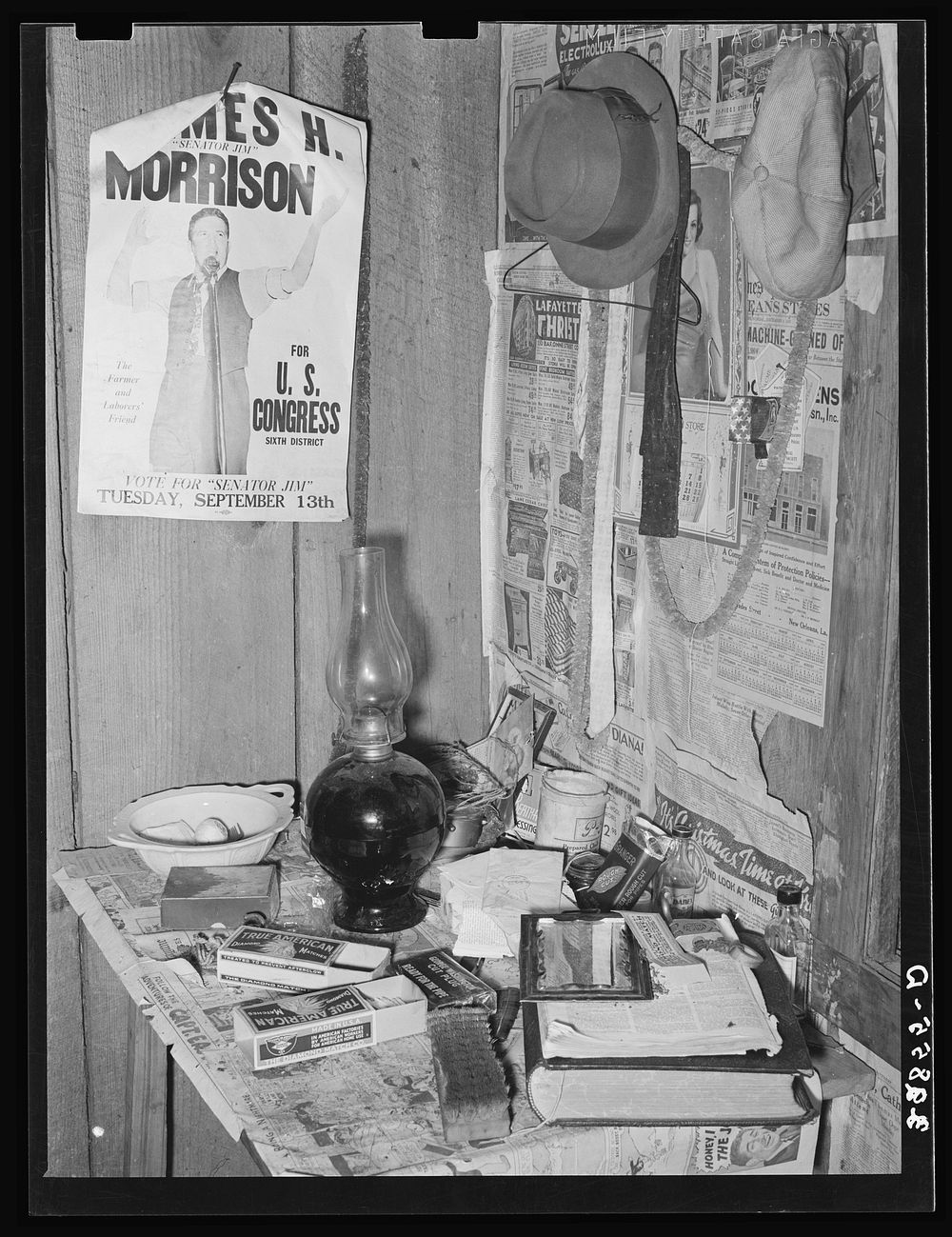 Corner of living room of strawberry sharecropper. Hammond, Louisiana by Russell Lee