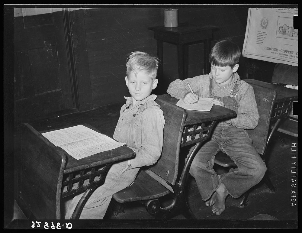 Children in rural school. San Augustine County, Texas. Boy on left has hookworm. The hookworm infestation of rural children…