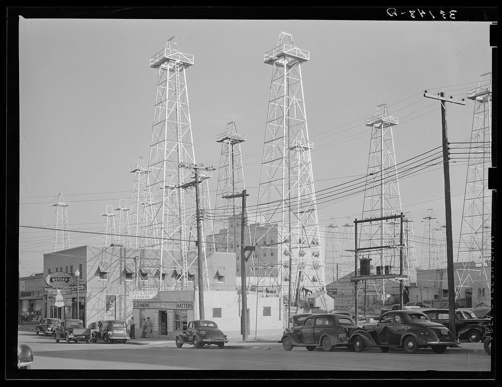 [Untitled photo, possibly related to: Downtown section of Kilgore, Texas, studded with oil derricks] by Russell Lee
