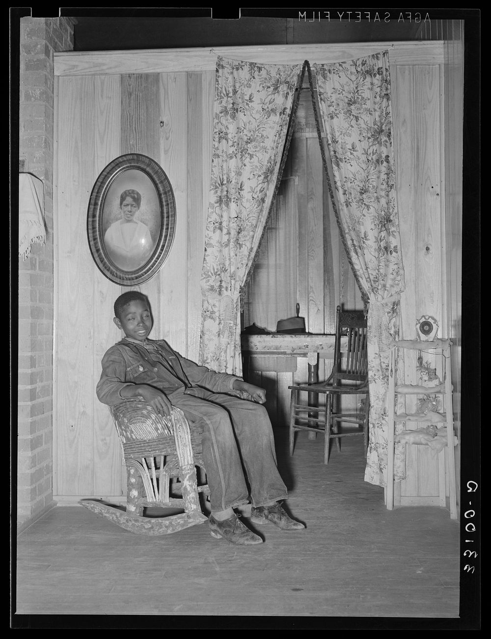 Looking into kitchen from living room of FSA (Farm Security Administration) client home. Sabine Farms, Marshall, Texas by…
