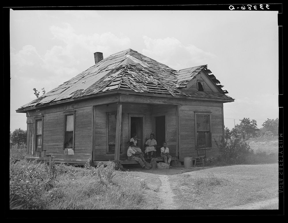 Home of  agricultural day laborer's home in Muskogee County, Oklahoma. These houses rent from two to five dollars per month.…