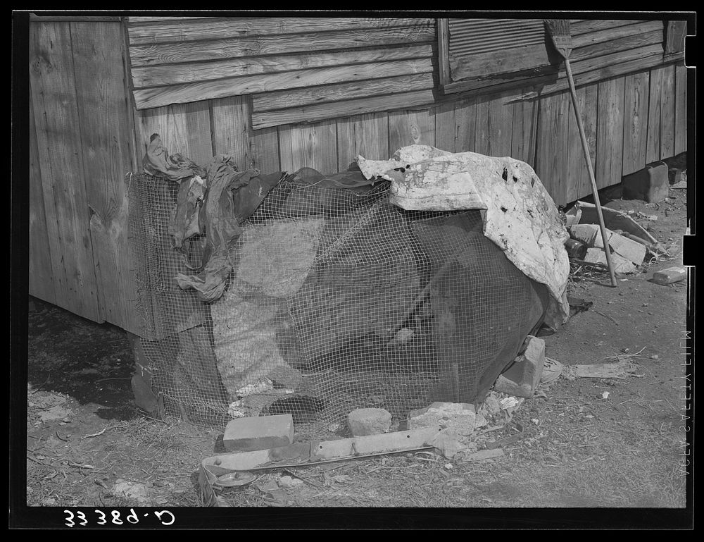 Chicken coop of  agricultural day laborer. Muskogee County, Oklahoma by Russell Lee