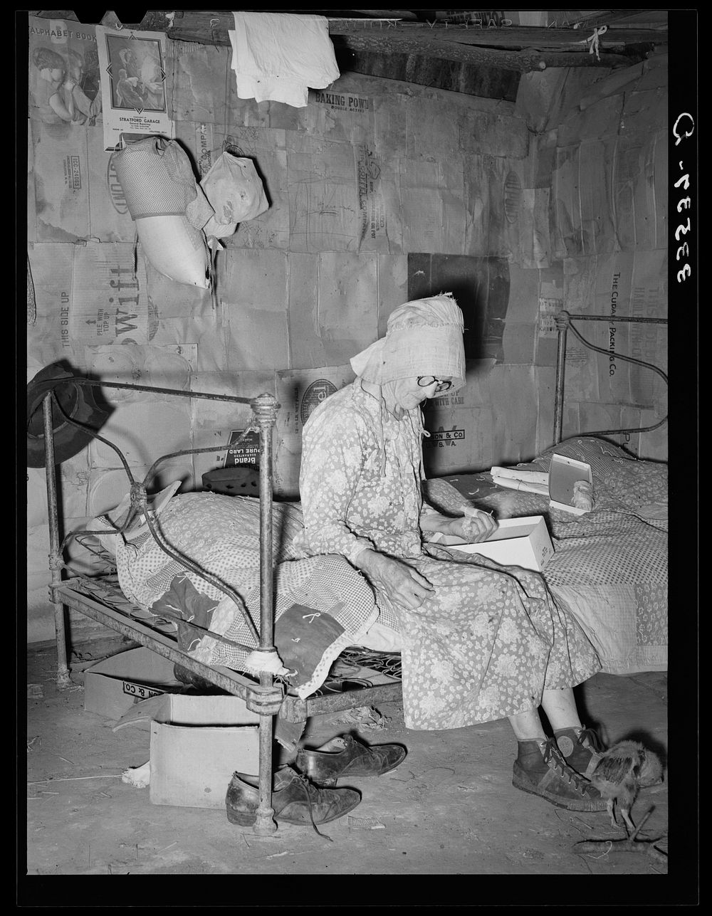 Widow, tenant farmer, in her home in McIntosh County, Oklahoma by Russell Lee