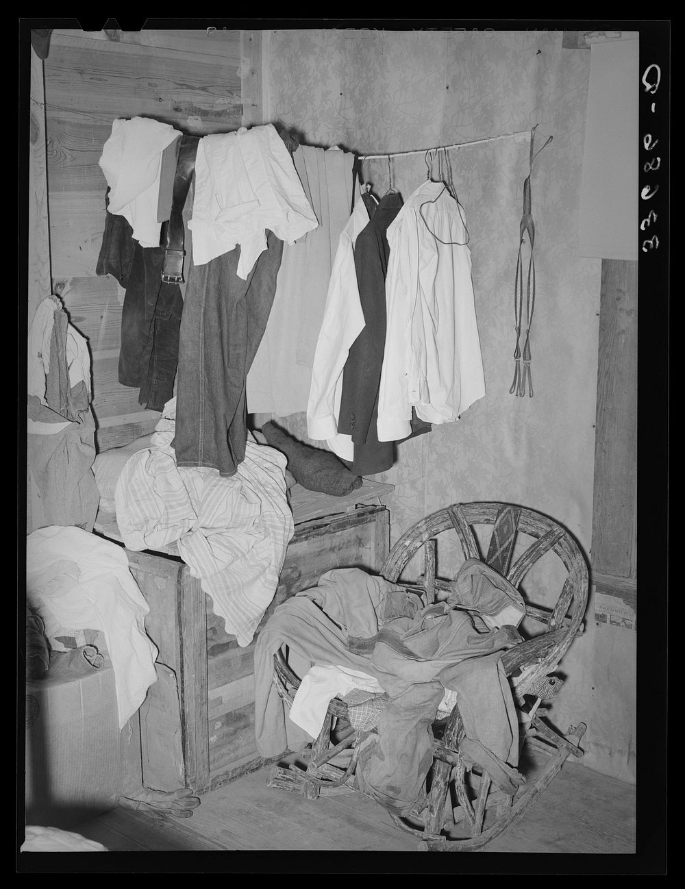Corner of bedroom of tenant farmer's home near Sallisaw, Oklahoma by Russell Lee