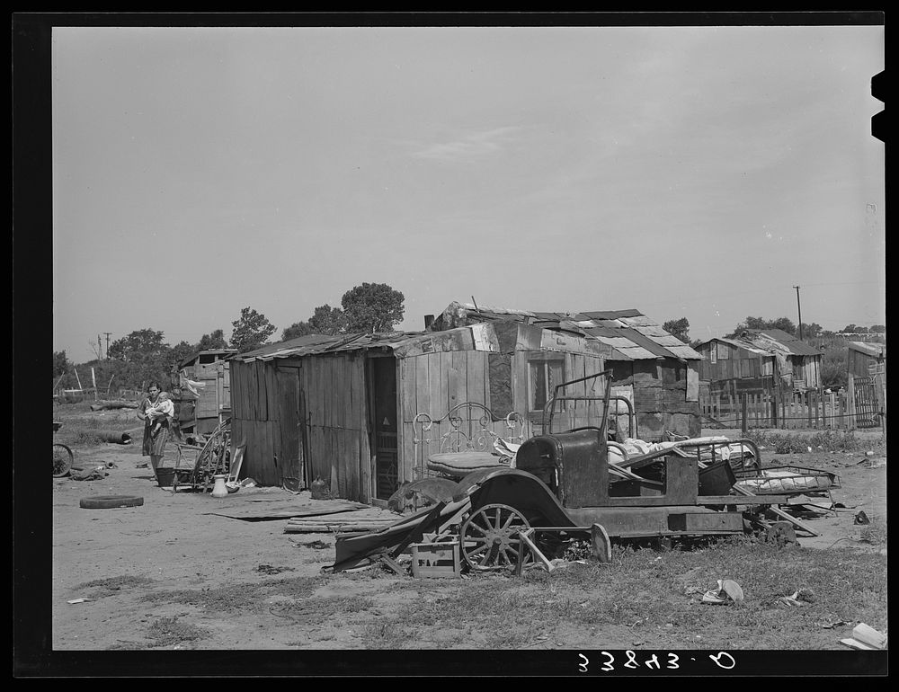 Shack home of family living in community camp. Oklahoma City, Oklahoma. Refer to general caption no. 21 by Russell Lee