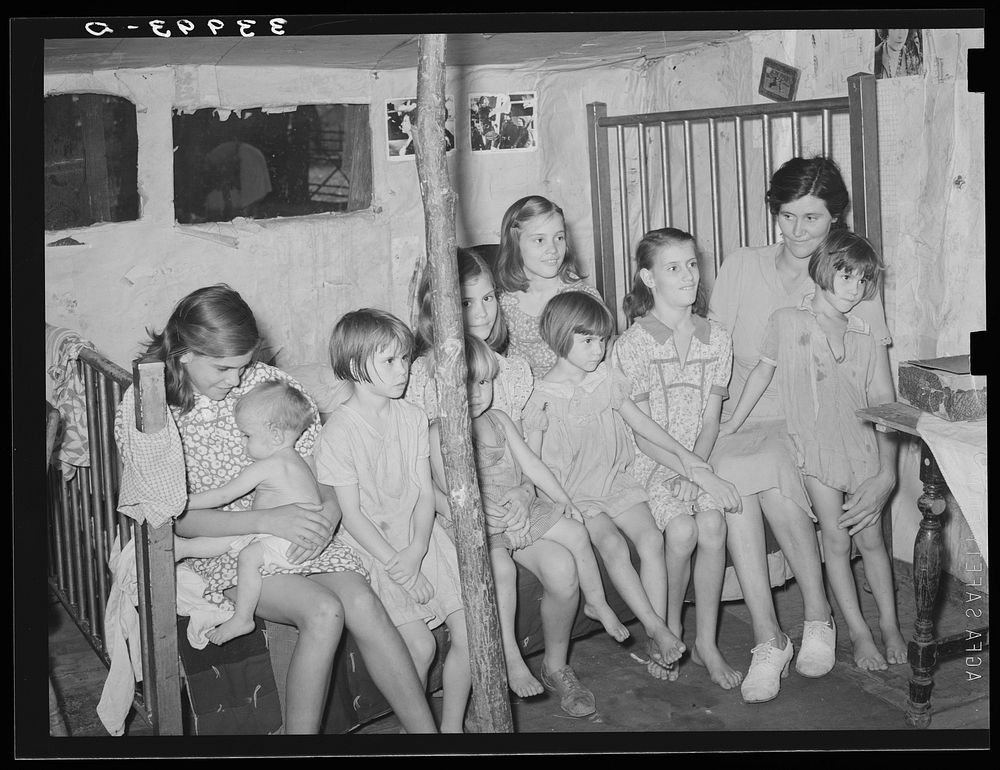 Family living in community camp. Oklahoma City, Oklahoma. Father is in hospital with broken back received when he fell from…