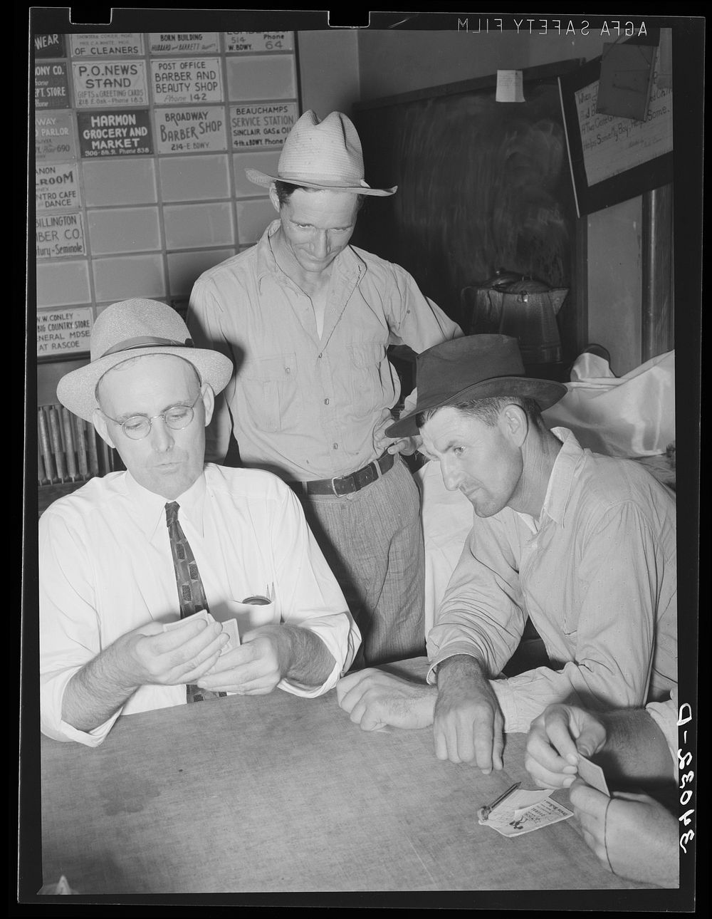 Game of cards at oil workers' union headquarters. Seminole, Oklahoma by Russell Lee