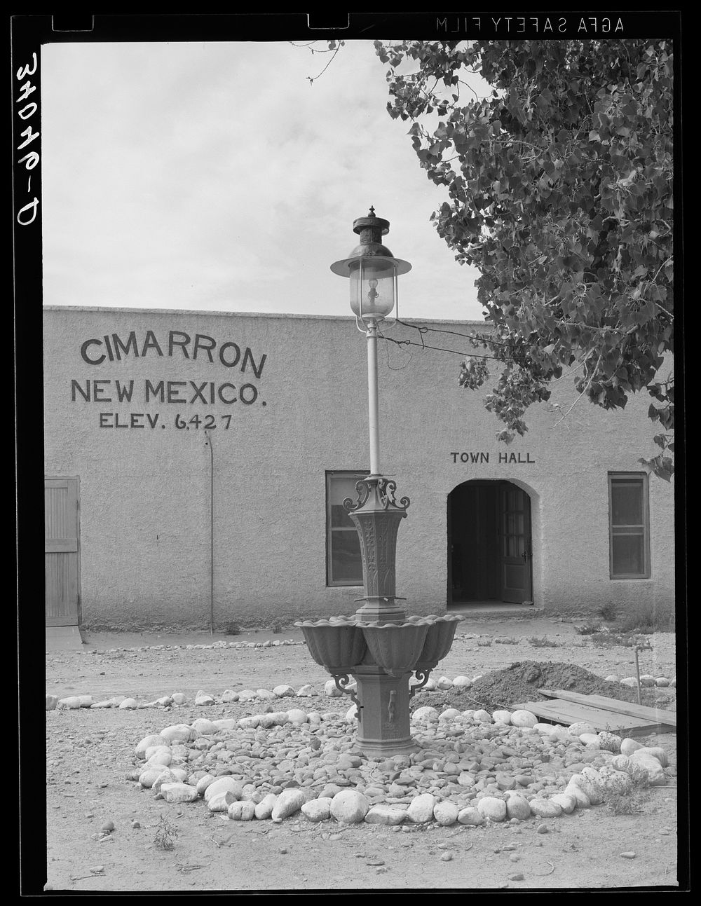 Town hall and light standard. Cimarron, New Mexico by Russell Lee