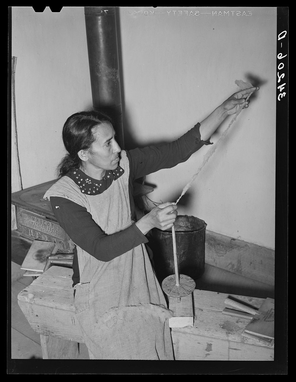 Spanish-American woman spinning woolen thread at WPA (Works Progress Administration/Work Projects Administration) project.…