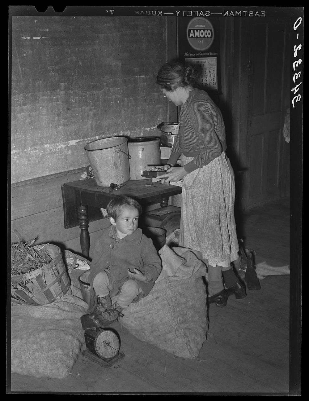 Kitchen in the home of a FSA (Farm Security Administration) borrower near Bradford, Vermont. Orange County by Russell Lee