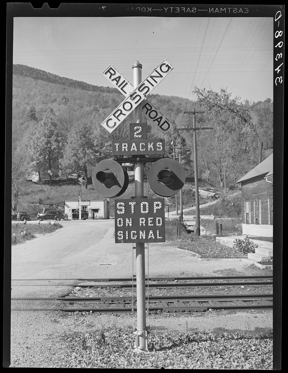 Railroad crossing near Shaftsbury, Vermont by Russell Lee