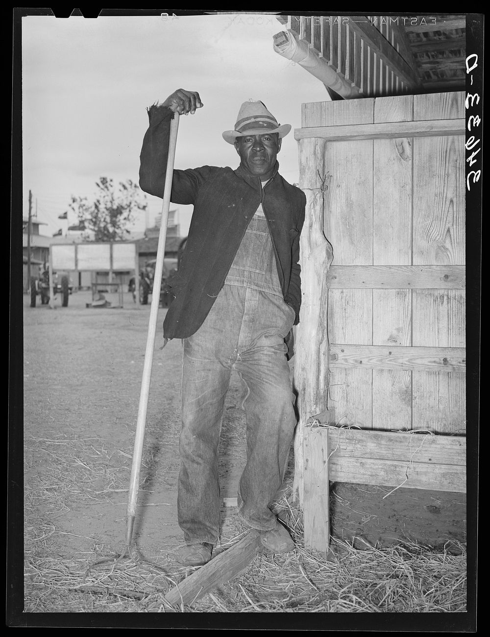 Worker in the show barns at the Gonzales County Fair. Gonzales, Texas by Russell Lee