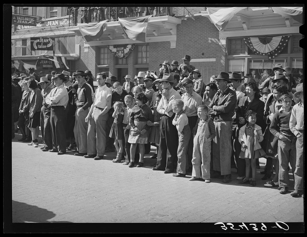 Spectators at the parade which opened the Fat Stock Show. San Angelo, Texas by Russell Lee
