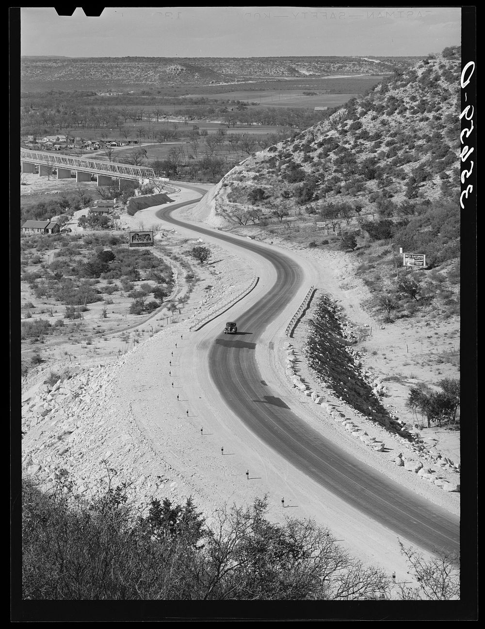 [Untitled photo, possibly related to: Highway leading into Junction, Texas, which is in the center of the goat and sheep…