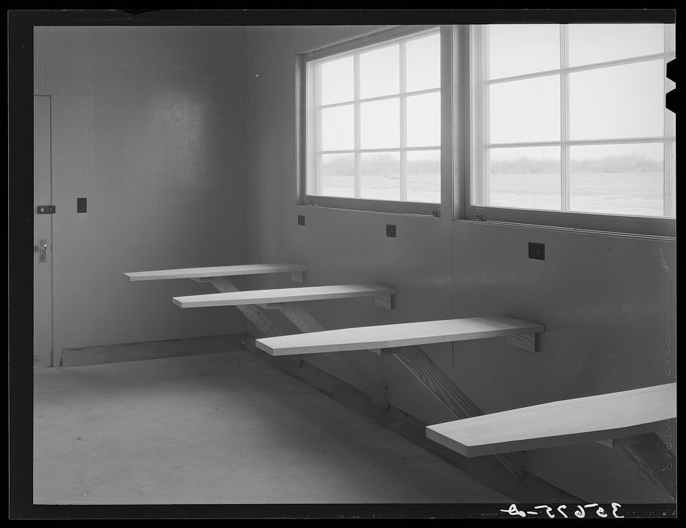 Interior of ironing room at migratory labor camp at Sinton, Texas by Russell Lee