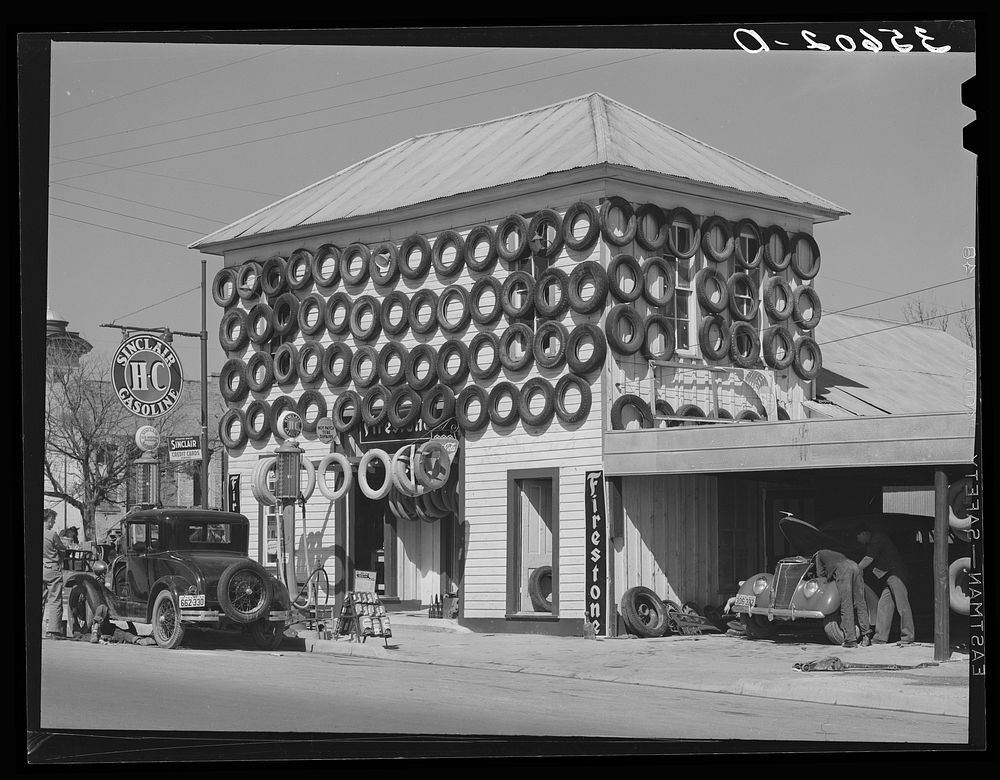 [Untitled photo, possibly related to: Secondhand tires displayed for sale. San Marcos, Texas] by Russell Lee