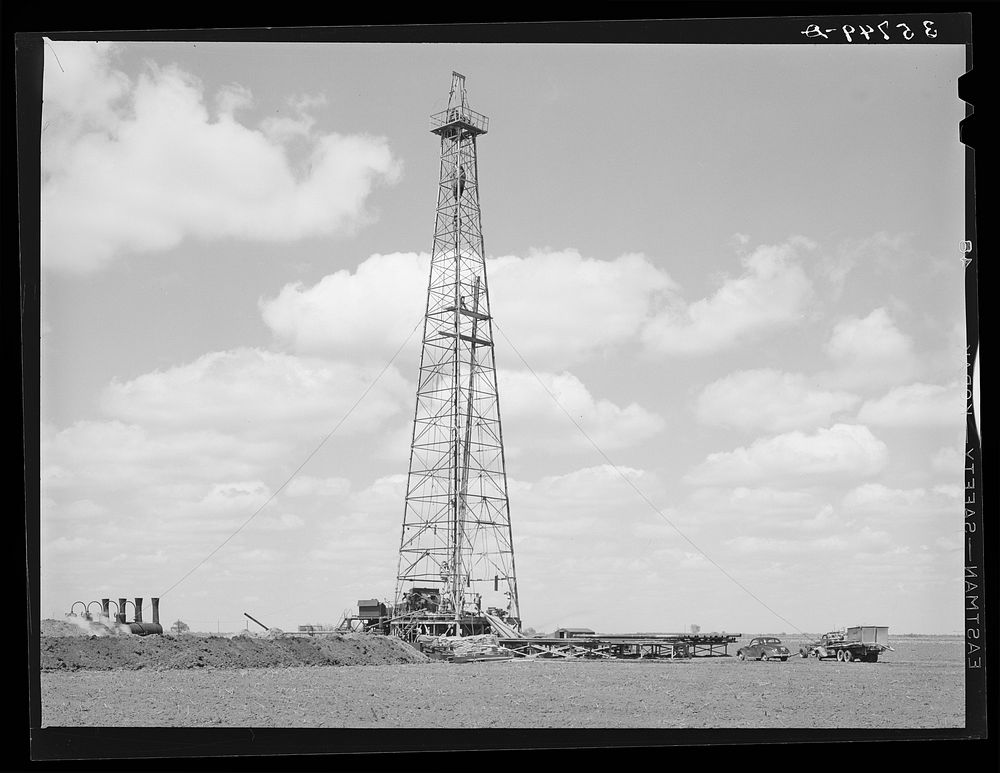 Oil well being drilled in San Patricio County, Texas by Russell Lee