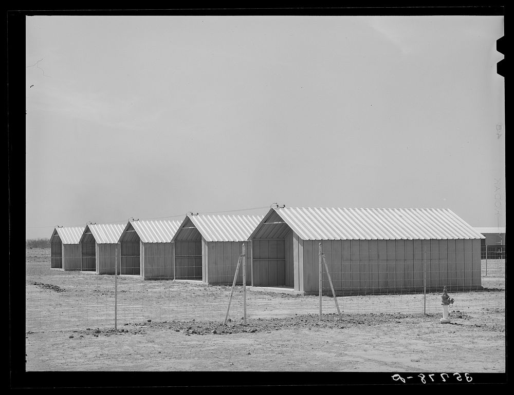 [Untitled photo, possibly related to: Sheet metal isolation units at the migratory labor camp. Sinton, Texas. These will be…