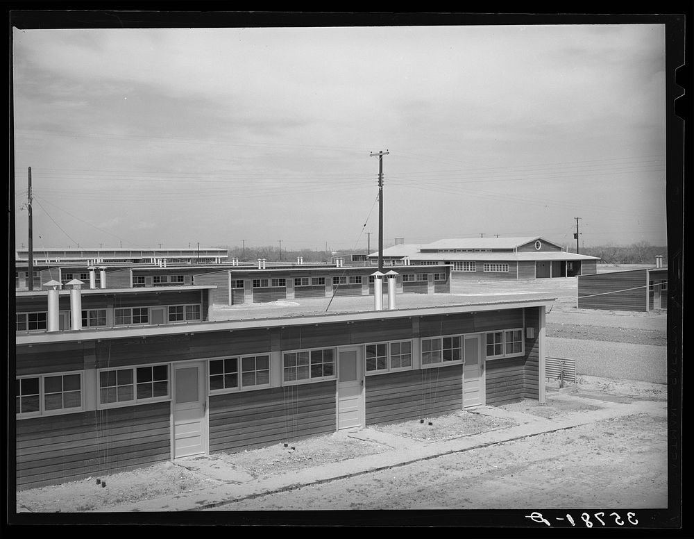 Row shelters for migratory workers at the migratory labor camp. Sinton, Texas by Russell Lee