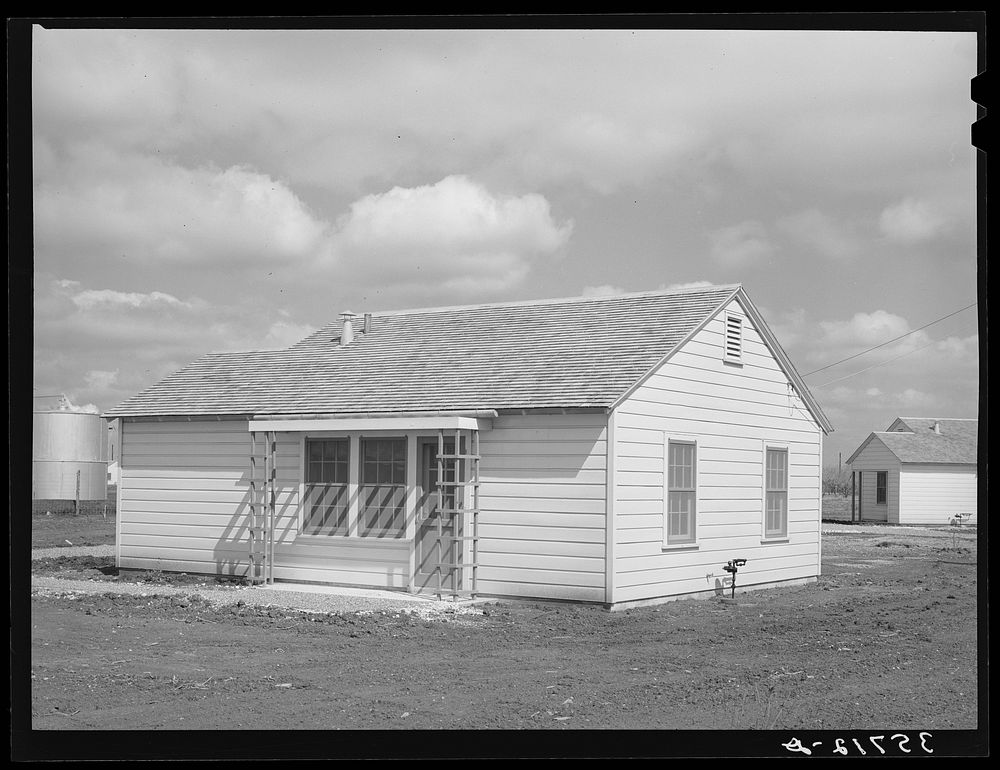 Type of house built for permanent agricultural workers at migratory labor camp. Robstown, Texas by Russell Lee
