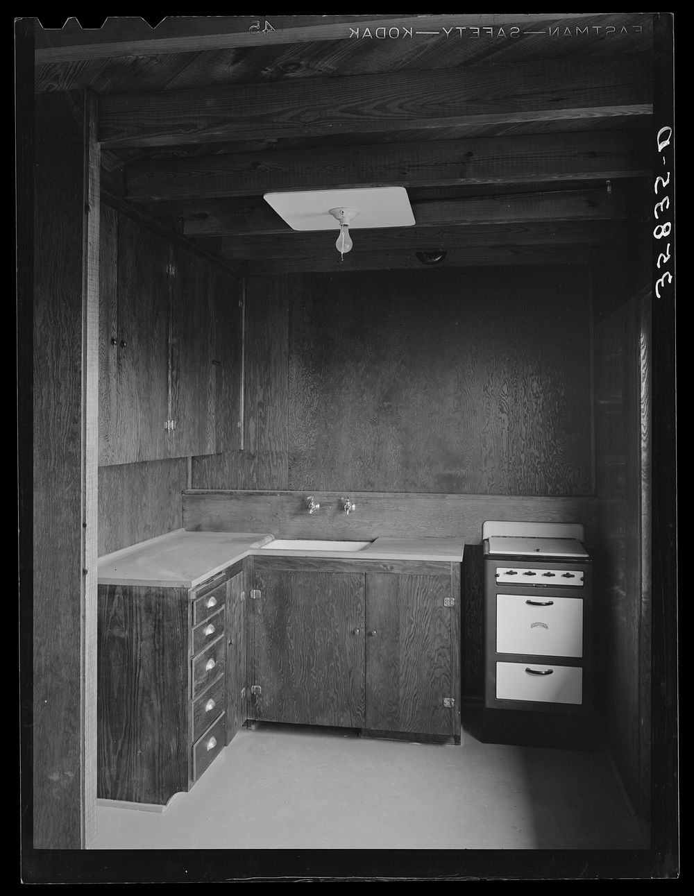 [Untitled photo, possibly related to: Kitchen in the multi-family unit for permanent agricultural workers at the migratory…