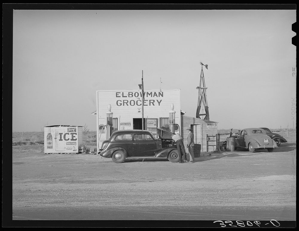 Grocery store and filling station in the high plains. Dawson County, Texas by Russell Lee