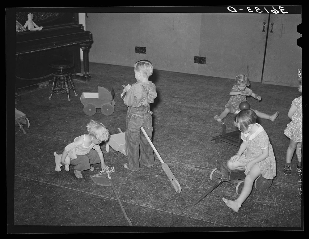 Children of agricultural laborers playing at the WPA (Work Projects Administration) nursery school at the Agua Fria…