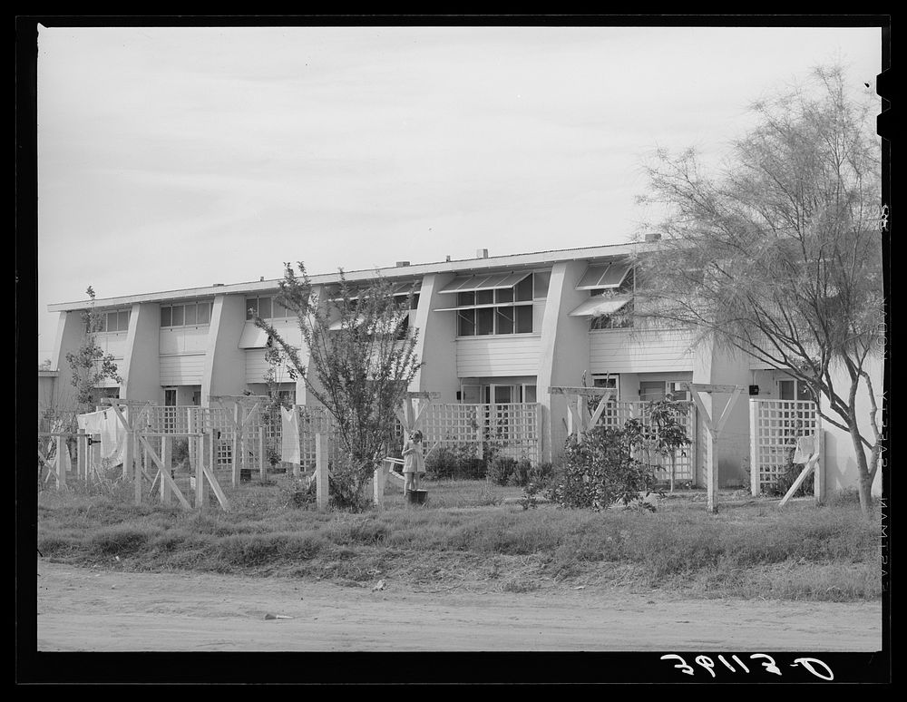 Rear view of apartment houses at the Arizona part-time farms. Chandler Unit, Maricopa County, Arizona by Russell Lee
