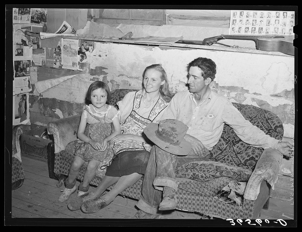 Faro and Doris Caudill with their daughter. Homesteaders, in their dugout home. Pie Town, New Mexico by Russell Lee