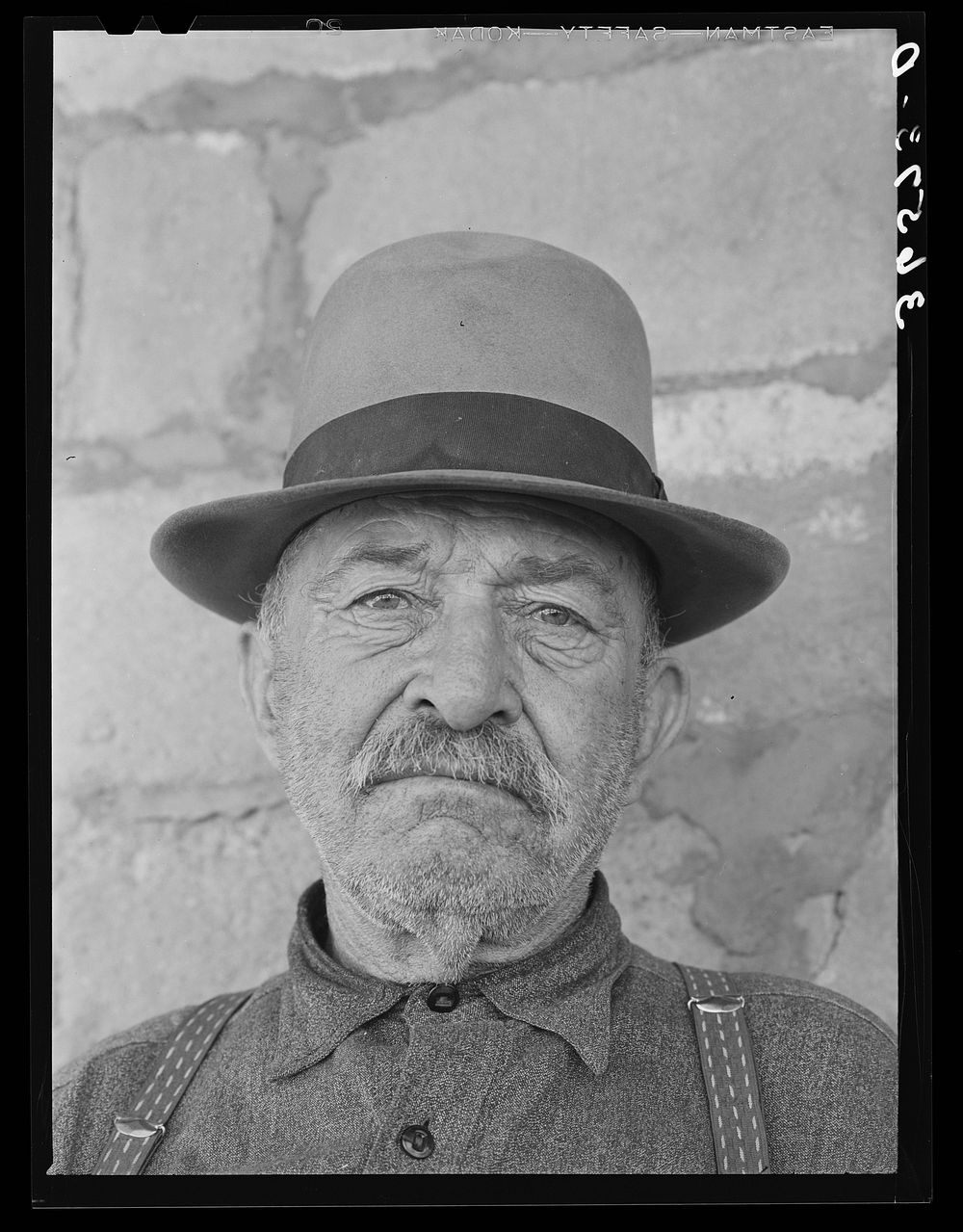 Uncle Bill, old character at Reserve, New Mexico. He says he is the only man alive who was tried before the court of Judge…