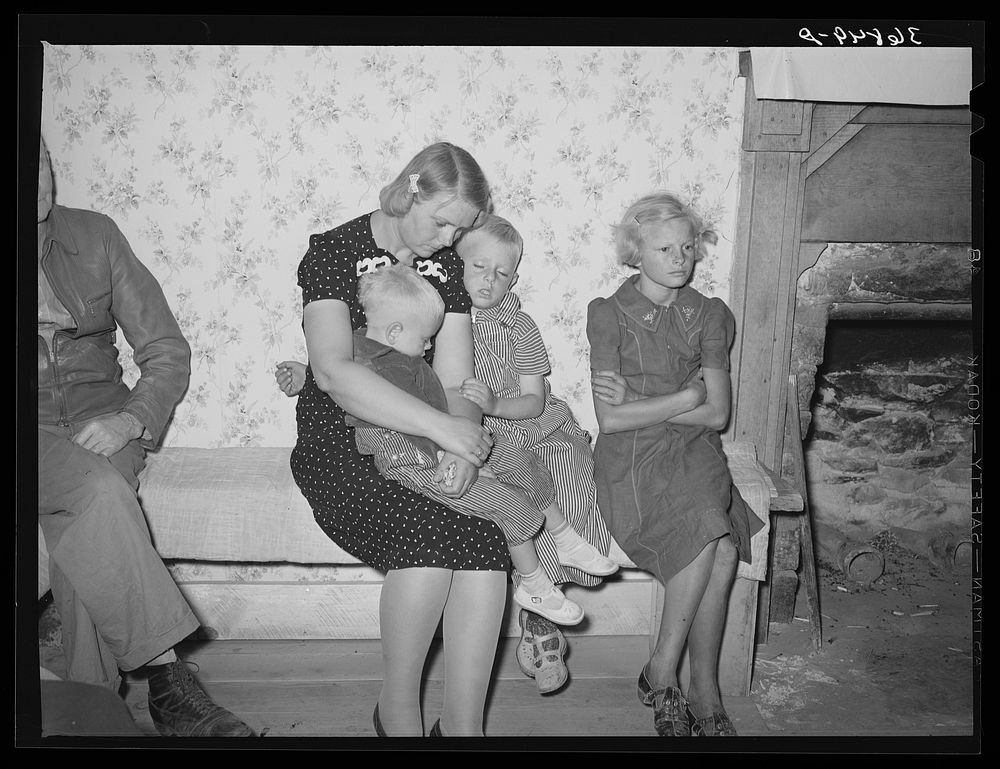 Tired spectators at the square dance. Pie Town, New Mexico by Russell Lee