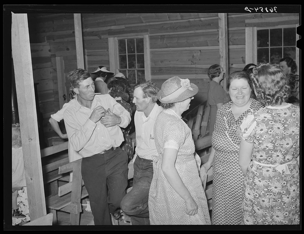 Group of farm people at the community sing. Pie Town, New Mexico by Russell Lee