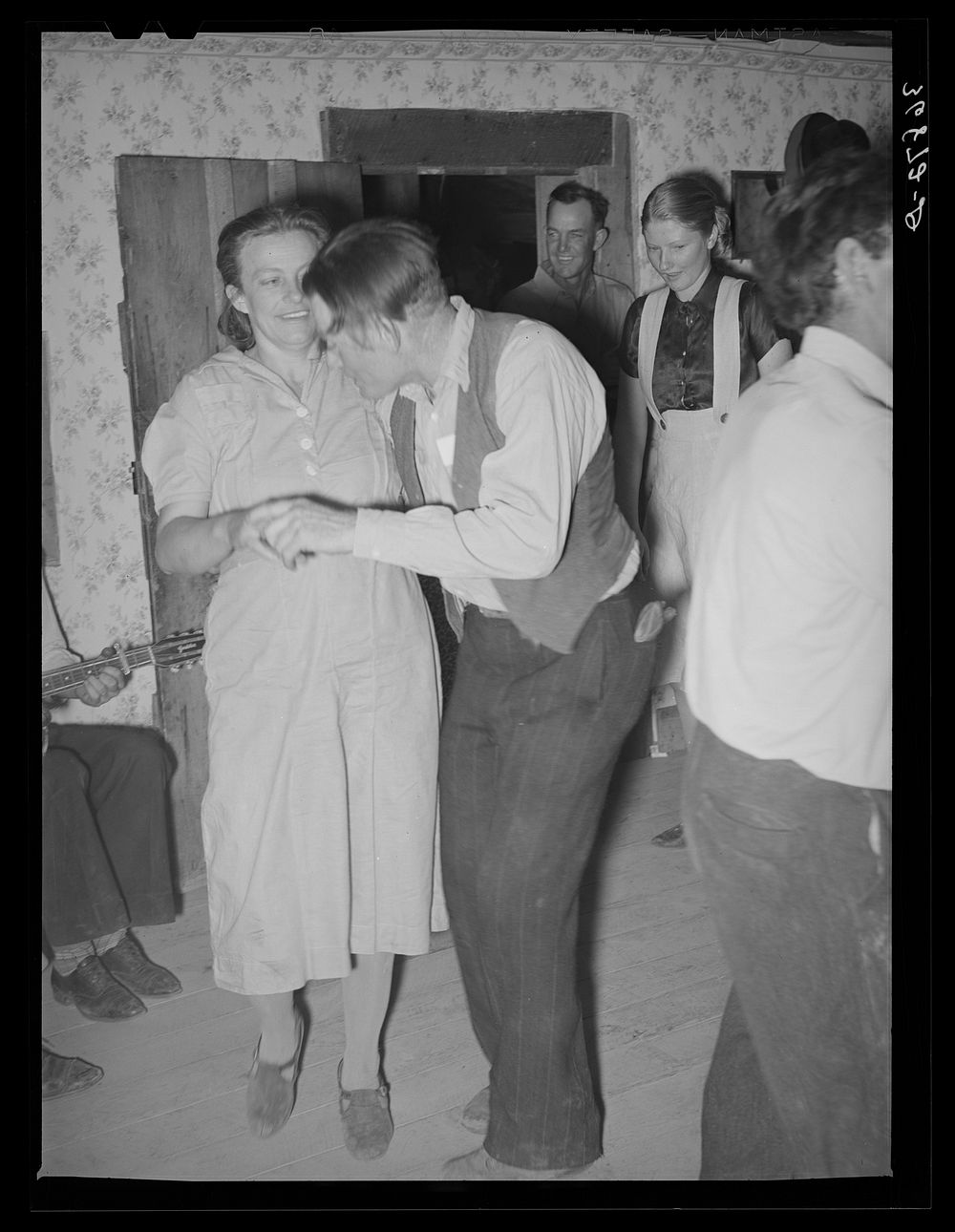 [Untitled photo, possibly related to: Round dance at the square dance. Pie Town, New Mexico] by Russell Lee