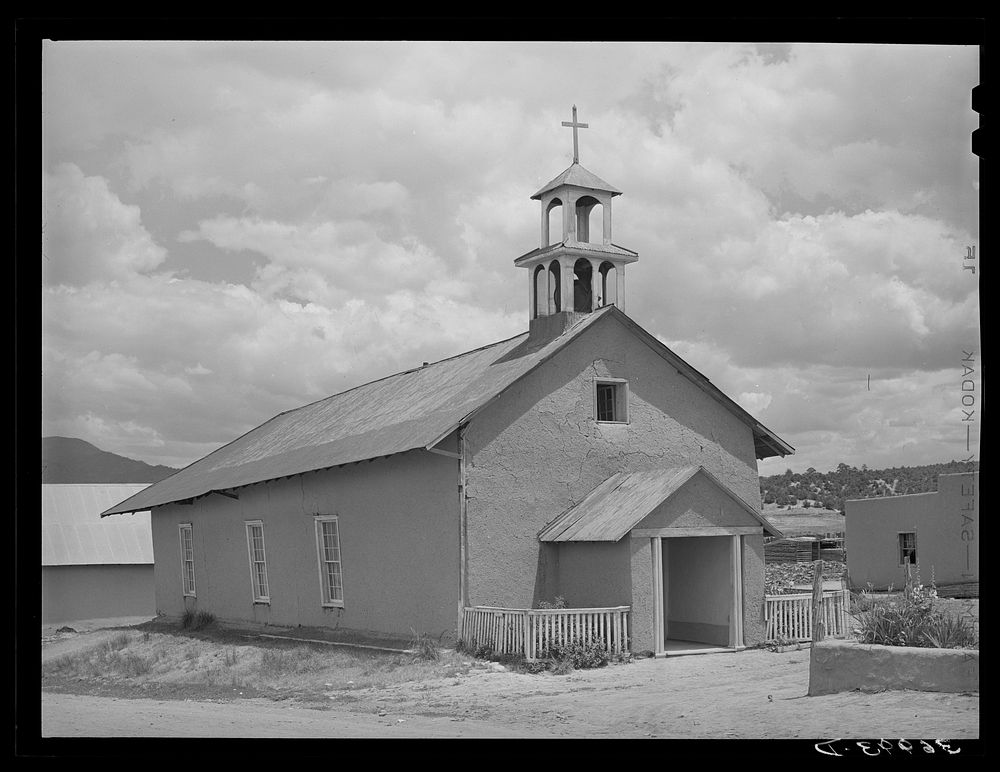 Catholic church. Chamisal, New Mexico by Russell Lee
