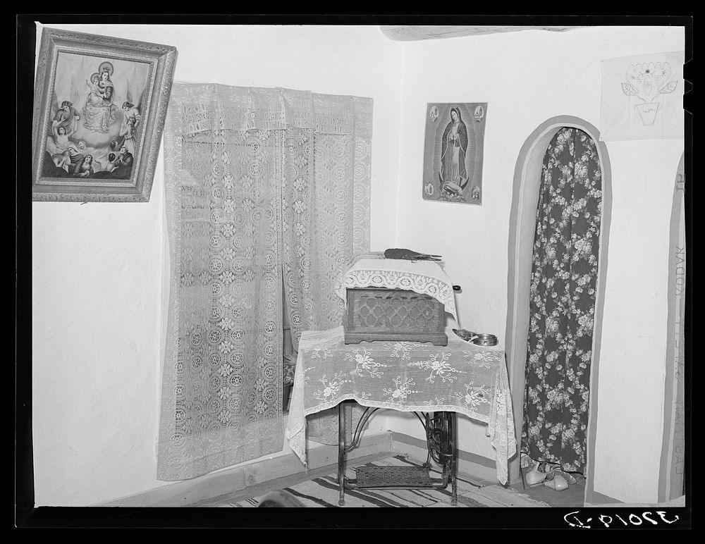 Corner of room in home of Spanish-American farmer. Chamisal, New Mexico by Russell Lee