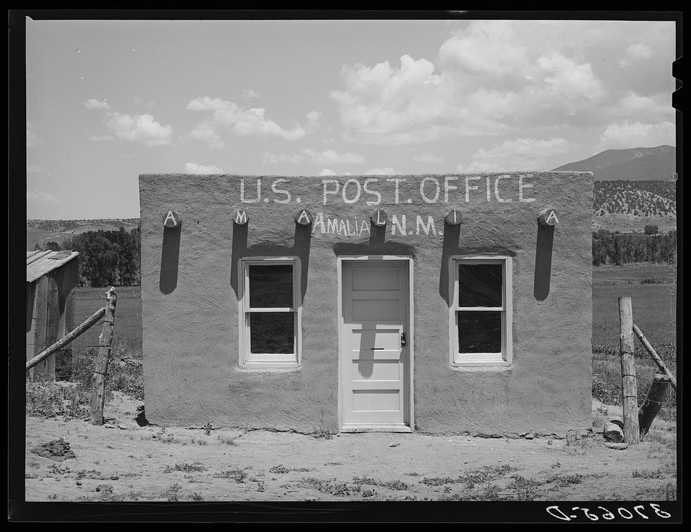 Post office. Amalia, New Mexico by Russell Lee