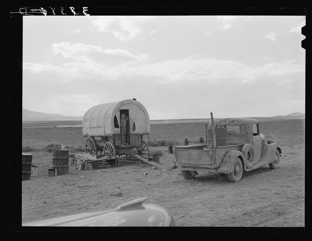 Camp of dryland Mormon farmer. He lives in Snowville, Utah, and is farming land in Oneida County, Idaho, which he has leased…