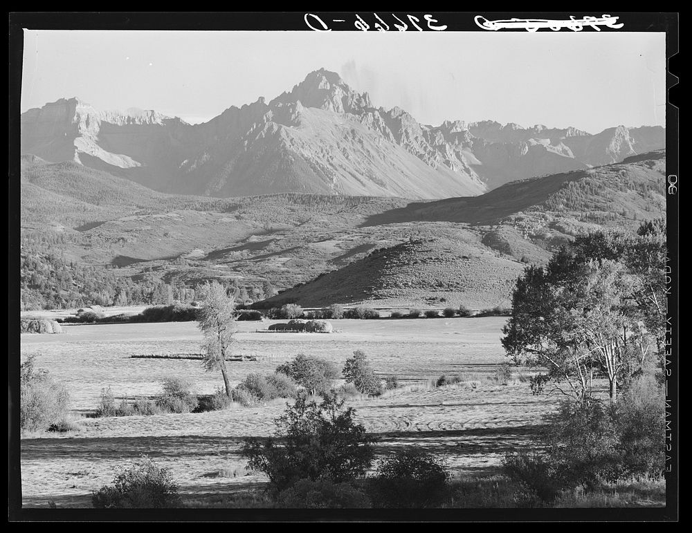 [Untitled photo, possibly related to: Mountain valley with Mount Sneffels in background. Ouray County, Colorado] by Russell…