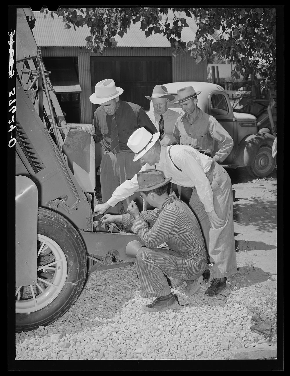 Committee of the Cornish corn machinery cooperative receiving instructions from the mechanic concerning the ensilage…