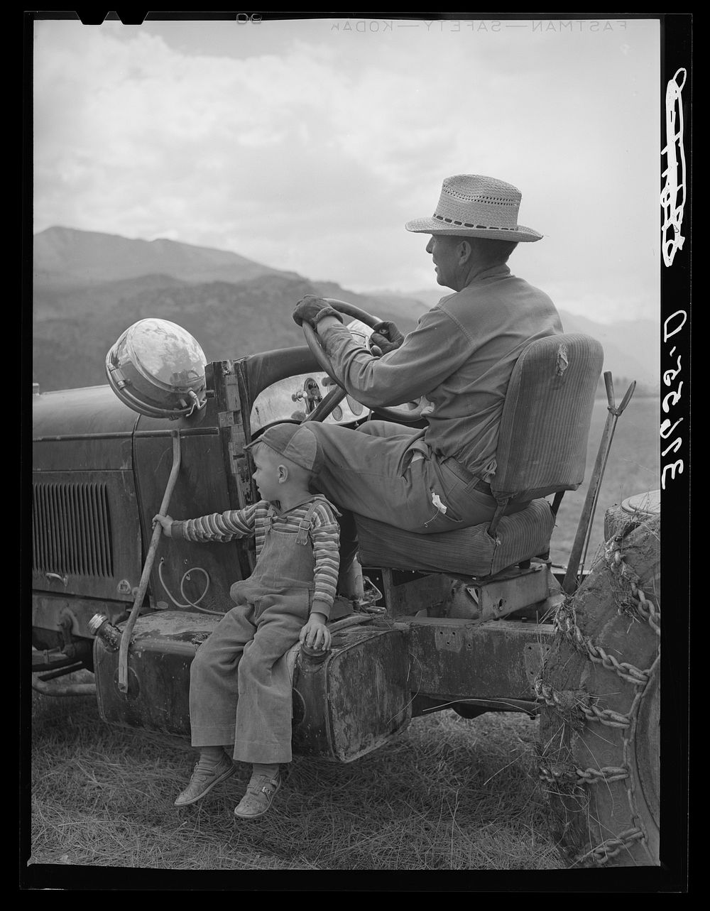 [Untitled photo, possibly related to: Farmer and his son. Ouray County, Colorado] by Russell Lee