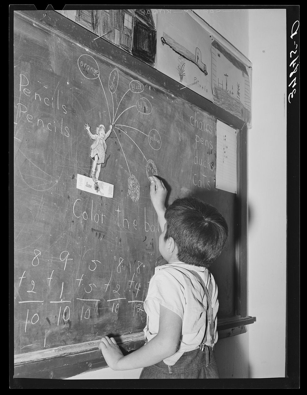 Grade school pupil at board. Concho, Arizona by Russell Lee