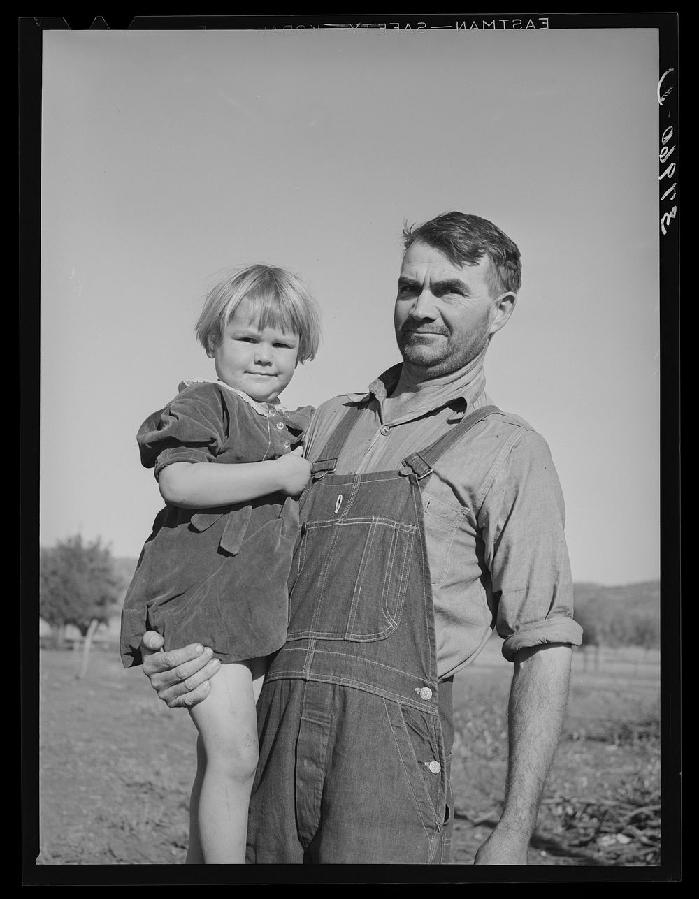 John Frost and his daughter. Mr. Frost is part owner of 135 acres of semi-marginal land in Tehama county, California. He has…