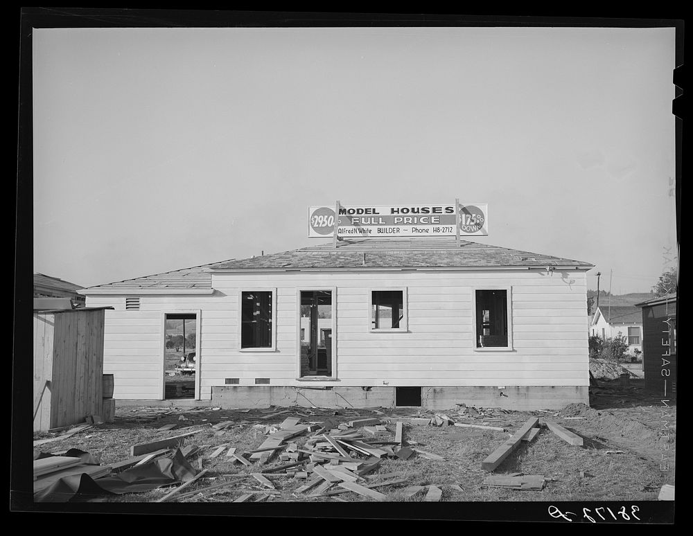 [Untitled photo, possibly related to: Roofing a house under construction at Pacific Beach, California, which is about six…